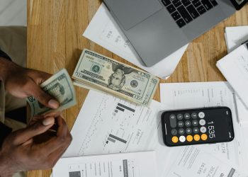 person creating a monthly budget