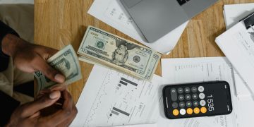 person creating a monthly budget