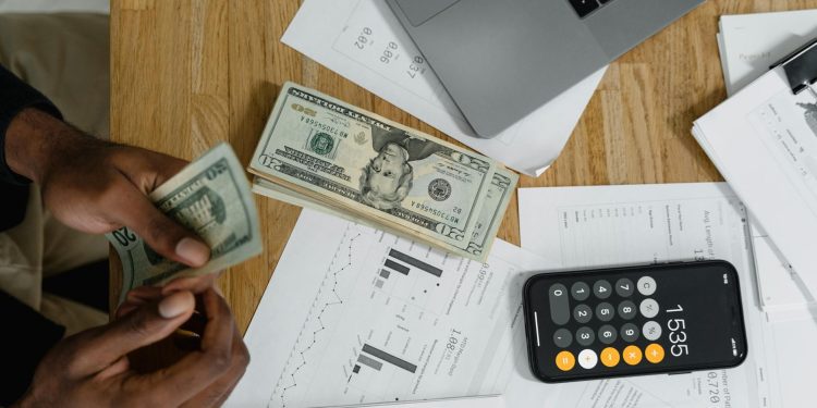 person creating a monthly budget